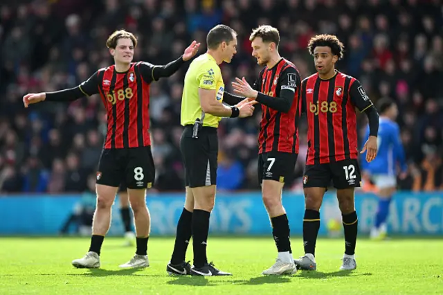 Referee, Jarred Gillett speaks with Alex Scott, David Brooks and Tyler Adams