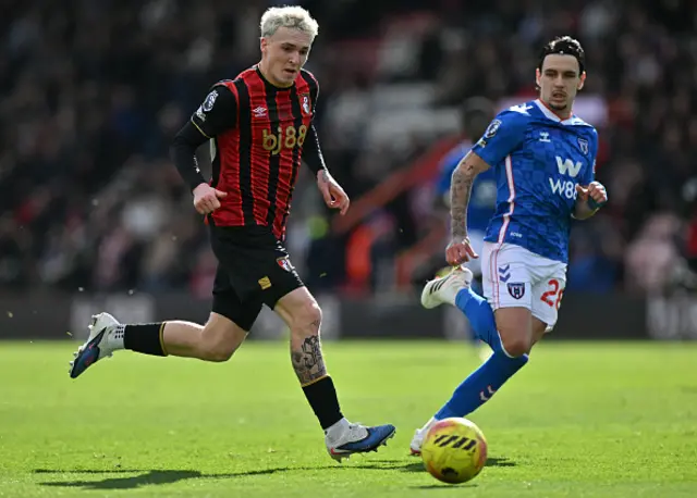 Alex Jimenez runs with the ball