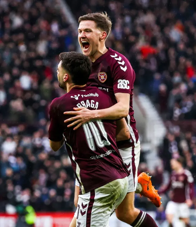 Claudio Braga and Blair Spittal celebrate