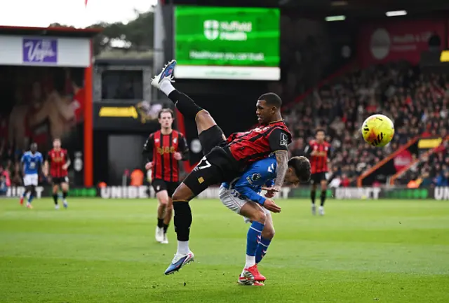Rayan of AFC Bournemouth clashes with Trai Hum