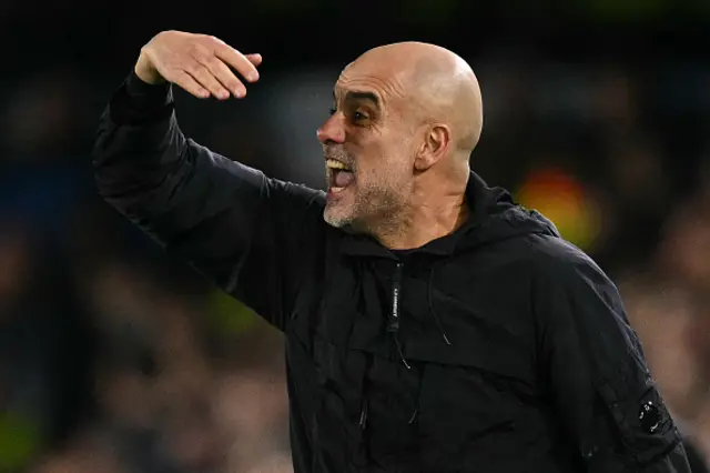 Pep Guardiola gestures