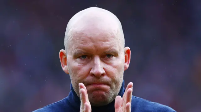 Henrik Pedersen with a glum expression but clapping his team's supporters