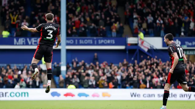 Southampton's Ryan Manning leaps into the air in celebration