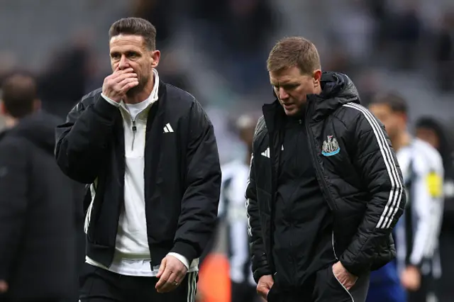 Eddie Howe, Manager of Newcastle United (R), and Jason Tindall, Assistant Coach of Newcastle United look dejected