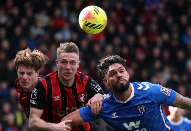 AFC Bournemouth's Alex Scott and Adrien Truffert in action with Sunderland's Omar Alderete