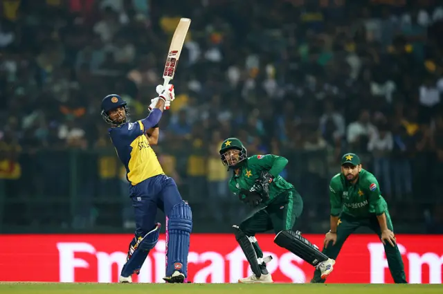 Dasun Shanaka of Sri Lanka plays a shot as Usman Khan of Pakistan keeps during the ICC Men's T20 World Cup India & Sri Lanka 2026 Super 8 match between Sri Lanka and Pakistan at Pallekele Cricket Stadium
