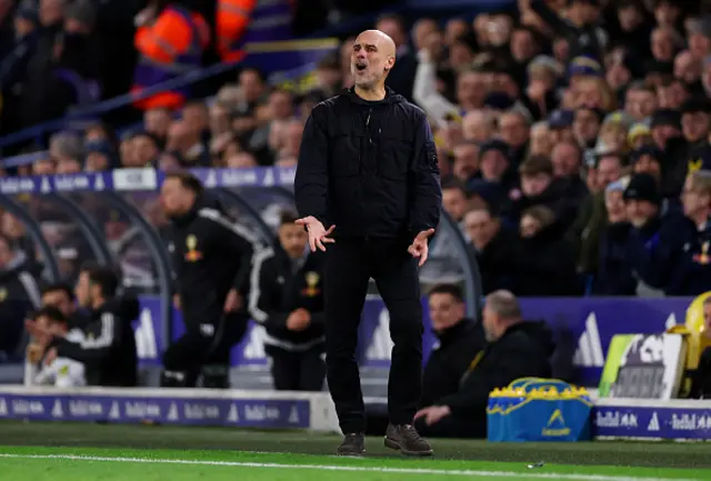 Pep Guardiola, Manager of Manchester City, reacts on the sideline
