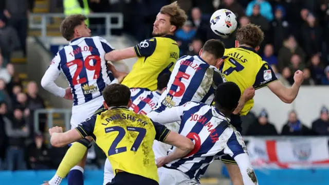 Stan Mills heads Oxford into the lead against West Brom
