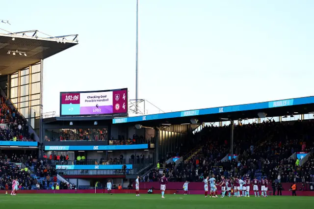 The screen in the stadium shows the goal of Ashley Barnes of Burnley under investigation by VAR