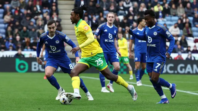 Norwich's Paris Maghoma dribbles past the Leicester defence