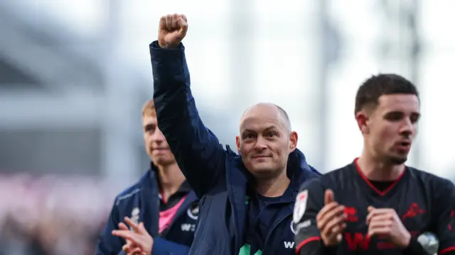 Alex Neil celebrates Millwall's win at Preston