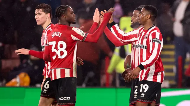 Sheffield United players celebrate in the win over Oxford