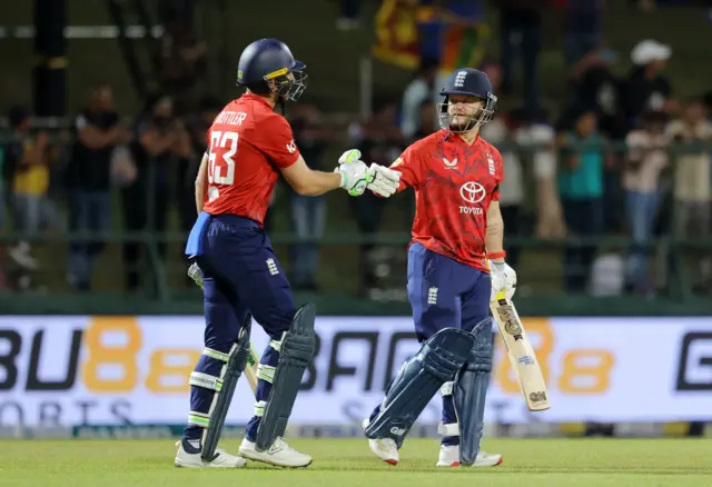 England's Ben Duckett and England's Jos Buttler