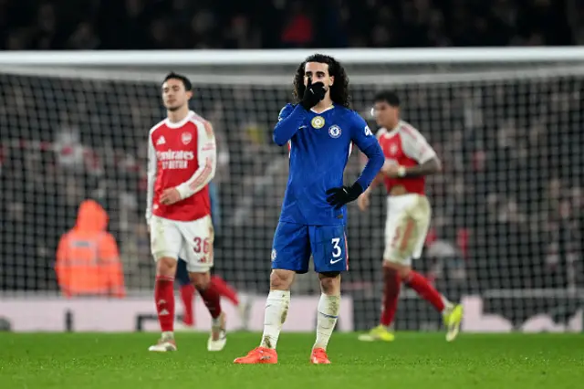 Cucurella looks on