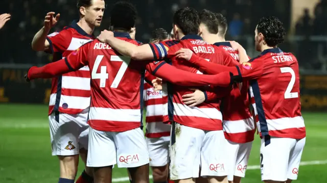 Doncaster celebrate scoring