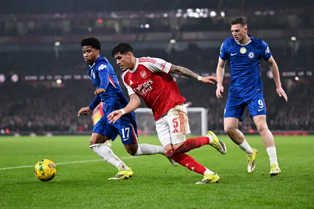 Piero Hincapie of Arsenal runs with the ball whilst under pressure from Andrey Santos and Liam Delap