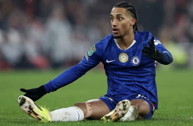 Chelsea's Joao Pedro reacts on the ground