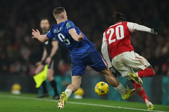 Liam Delap (L) is booked for this foul on Arsenal's English defender Noni Madueke