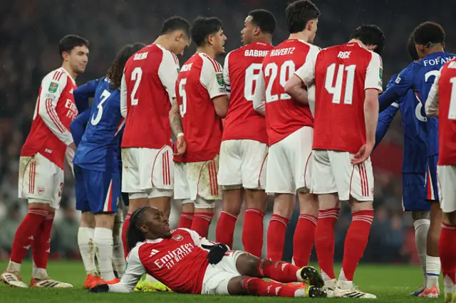 Eberechi Eze takes his position behind a defensive wall