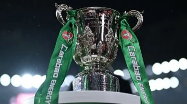 A detailed view of the Carabao Cup trophy on a plinth inside the stadium
