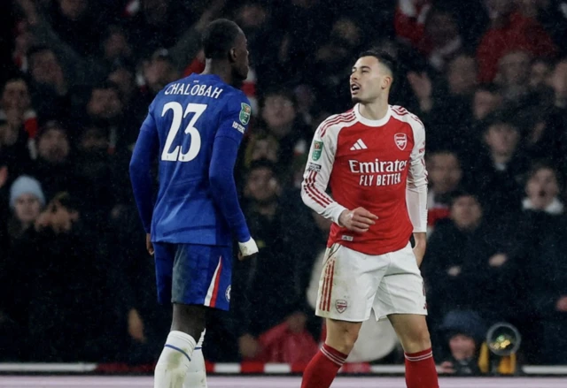 Arsenal's Gabriel Martinelli clashes with Chelsea's Trevoh Chalobah