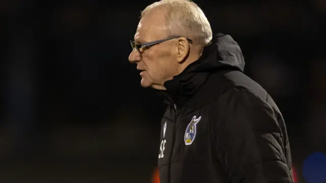 Steve Evans on the touchline