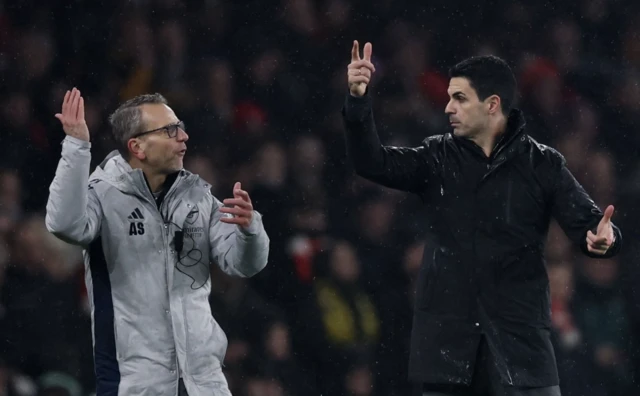 Arsenal manager Mikel Arteta and assistant manager Albert Stuivenberg react