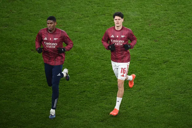Cristhian Mosquera and Christian Norgaard of Arsenal warm up
