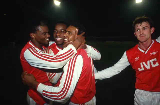 Paul Davis, Michael Thomas, David Rocastle and Martin Hayes of Arsenal celebrate their victory