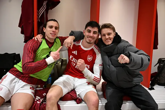 Riccardo Calafiori, Kai Havertz and Martin Odegaard of Arsenal celebrate victory