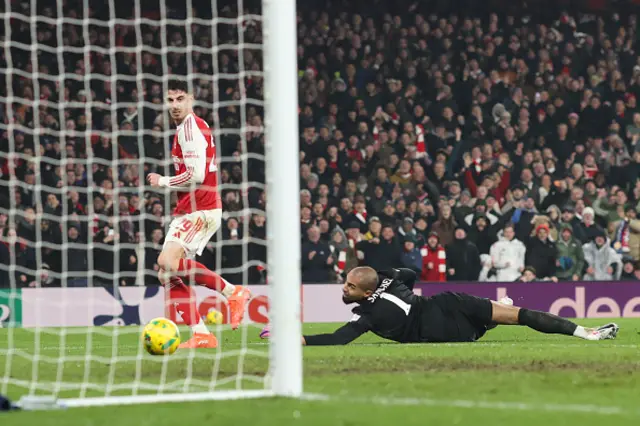 Kai Havertz of Arsenal scores their first goal past Chelsea goalkeeper Robert Sanchez