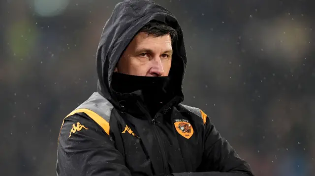 Sergej Jakirovic with coat over face