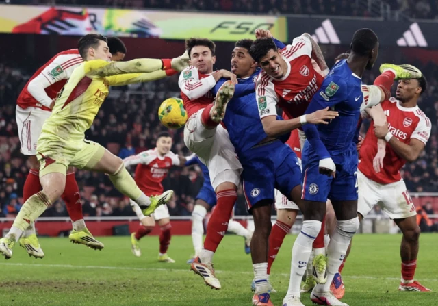 Chelsea's Moises Caicedo and Wesley Fofana in action with Arsenal's Piero Hincapie, Martin Zubimendi and Kepa Arrizabalaga