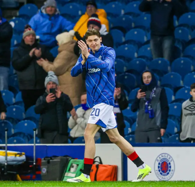 Ryan Naderi applauds the fans at Ibrox