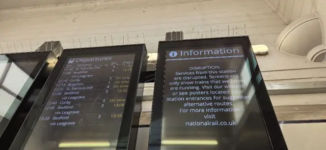 An information board at Luton train station showing disruption.