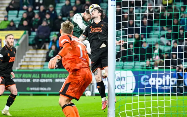 Martin Boyle hits the crossbar with a close-range header