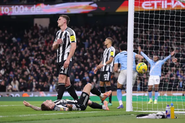 Sven Botman of Newcastle United and Kieran Trippier of Newcastle United react after conceding