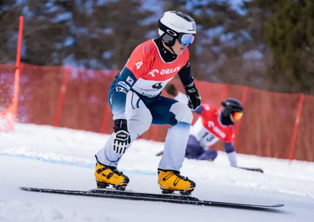 Parallel giant slalom athletes compete against each other