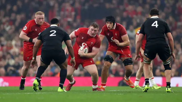 Rhys Carre on the run for Wales