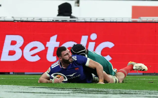 Charles Ollivon slides across to score