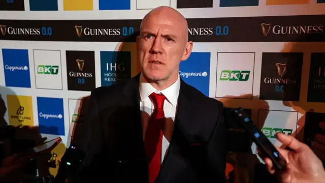 Steve Tandy faces media