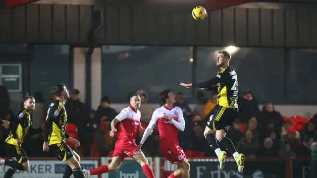 Accrington take on Salford at a wet and windy Wham Stadium