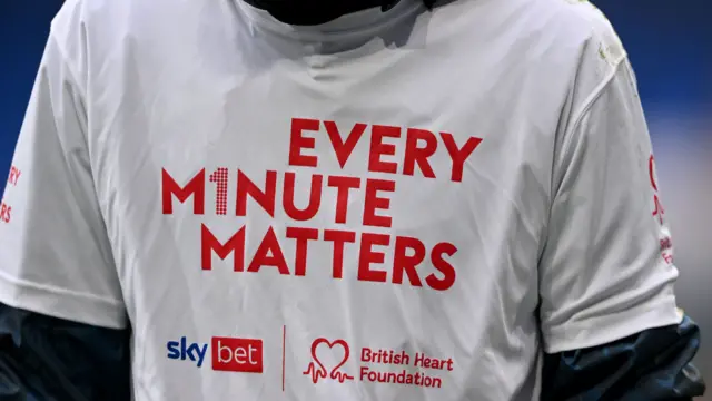 A white t-shirt bearing the slogan 'Every minute matters'