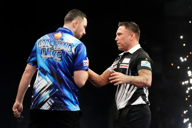England's Luke Humphries (left) celebrates defeating Wales' Gerwyn Price during the BetMGM Premier League Darts at the Utilita Arena, Newcastle upon Tyne