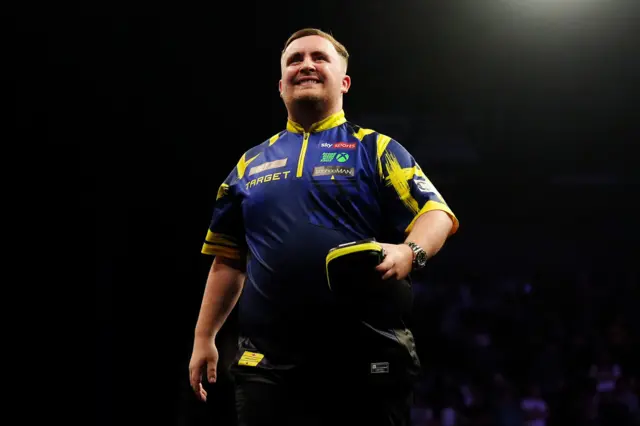 England's Luke Littler reacts after losing his match against Netherlands' Gian van Veen during the BetMGM Premier League Darts at the Utilita Arena, Newcastle upon Tyne
