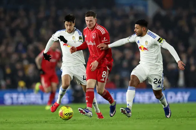 Anderson runs through two Leeds midfielders