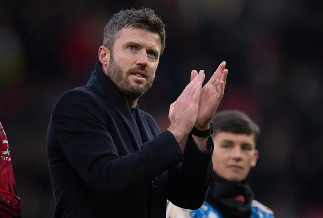 Carrick claps the fans