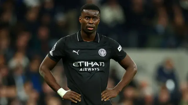 Marc Guehi with his hands on his hips