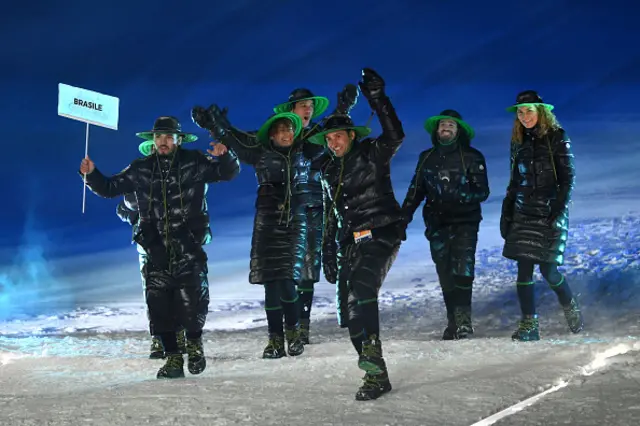 Athletes of Team Brazil walk in the parade