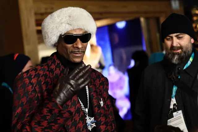Snoop Dogg looks on